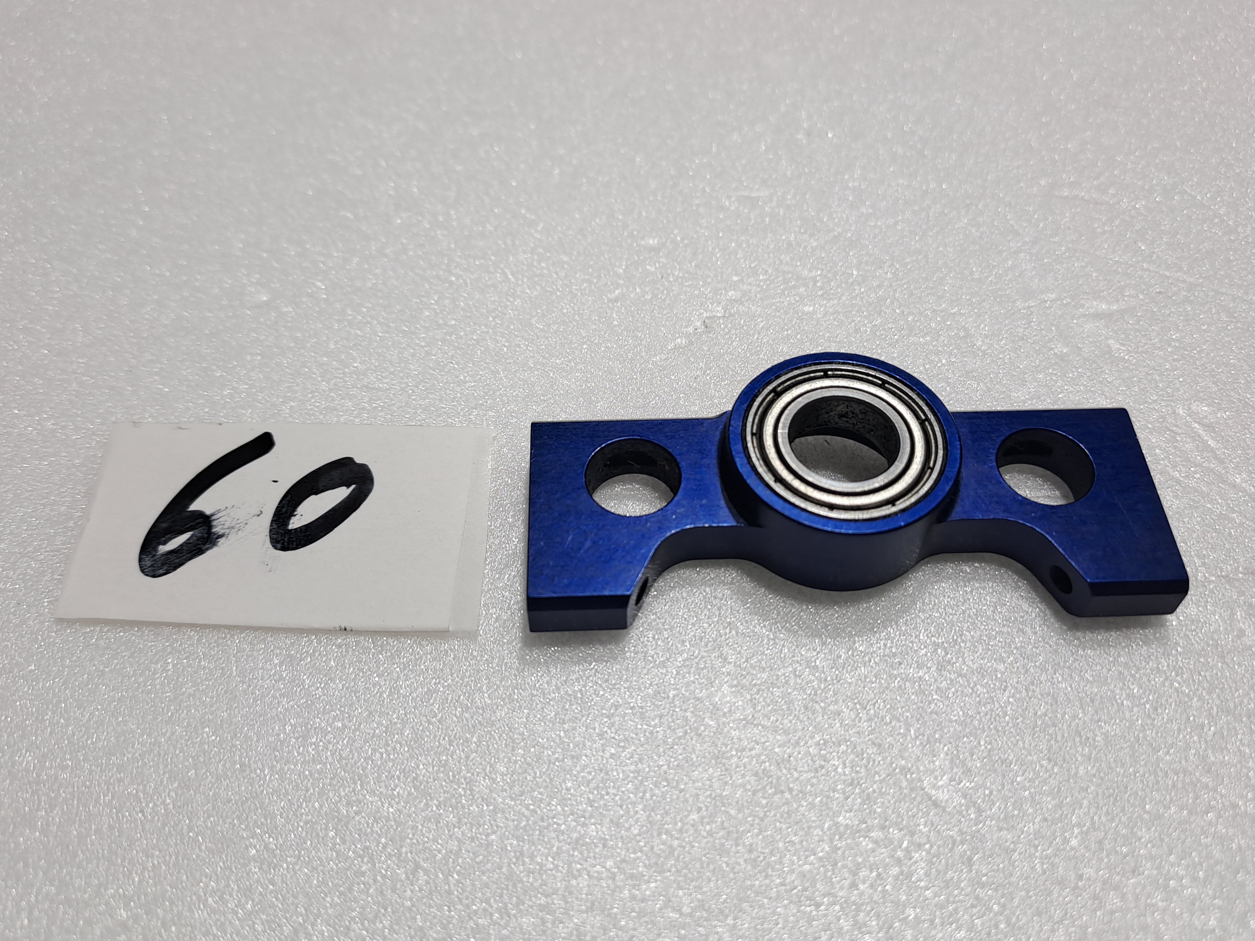 HIROBO SCEADU NITRO HELICOPTER BLUE ALLOY LOWER MAINSHAFT BEARING HOLDER WITH BEARING QUALITY PRE OWNED