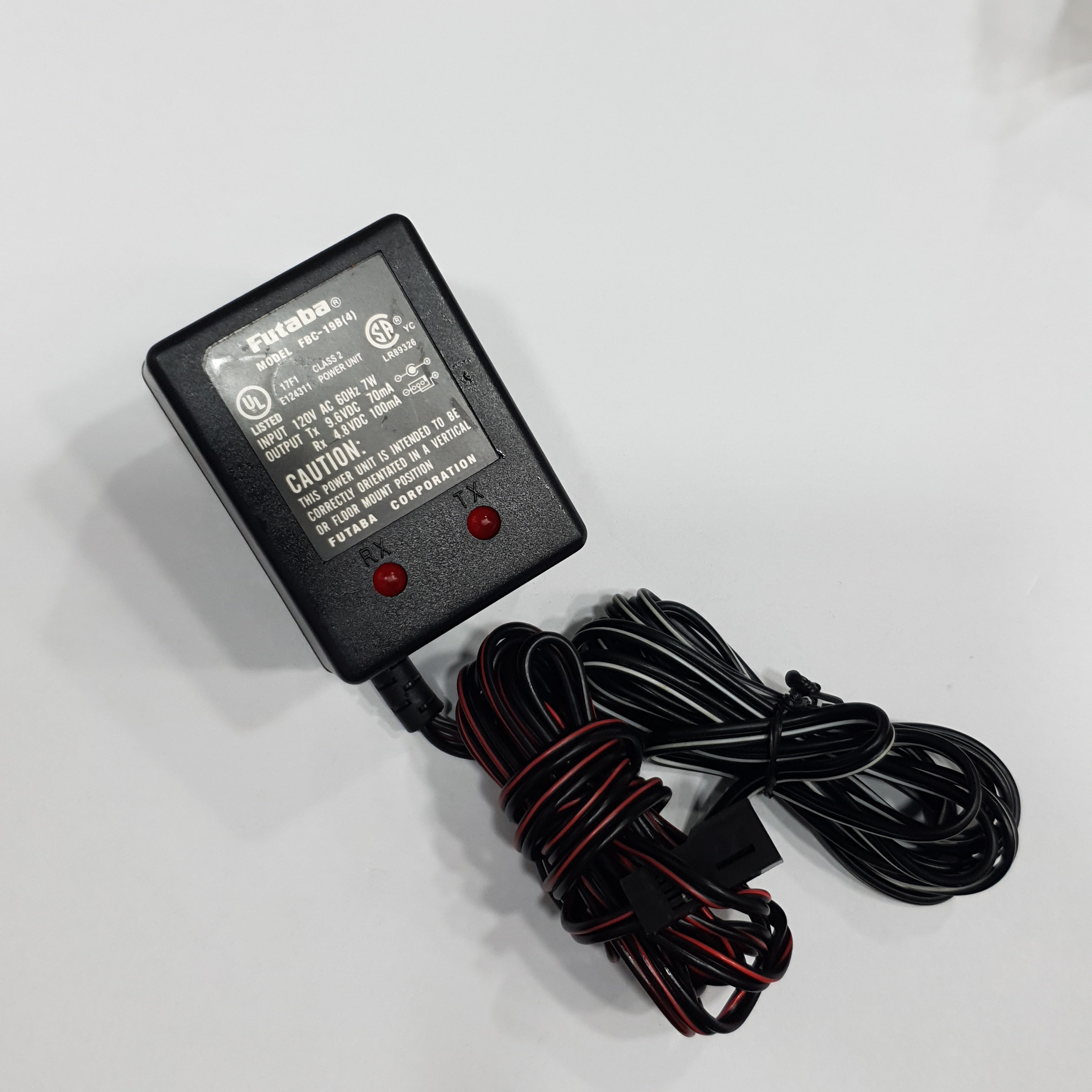 FUTABA MODEL FBC 19B(4) AC INPUT:120V DC OUTPUT:TX 9.6V 70MA / RX 4.8V 100MA