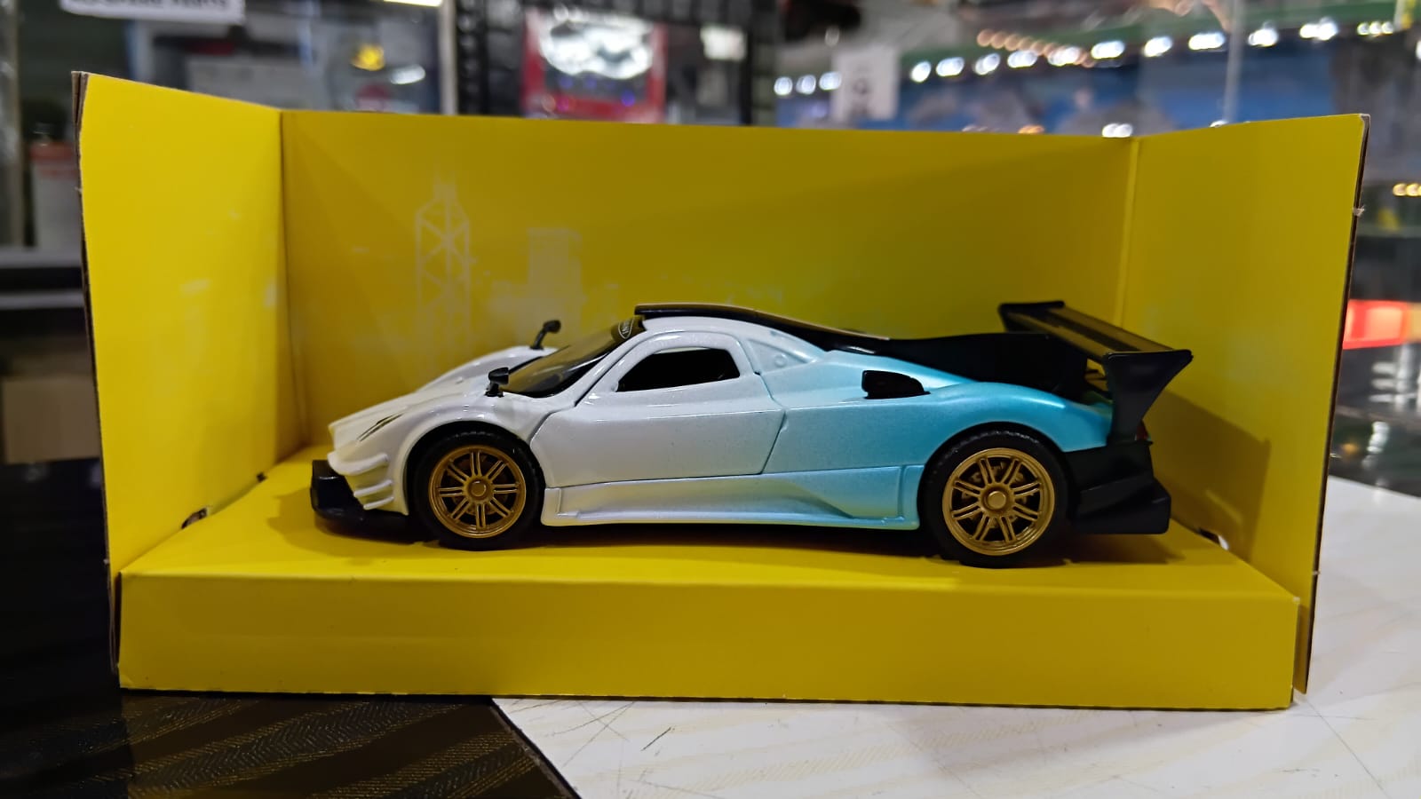 CCA 1:36 PAGANI ZONDA REVOLUCION DIECAST MODEL 12007 WHITE/BLUE