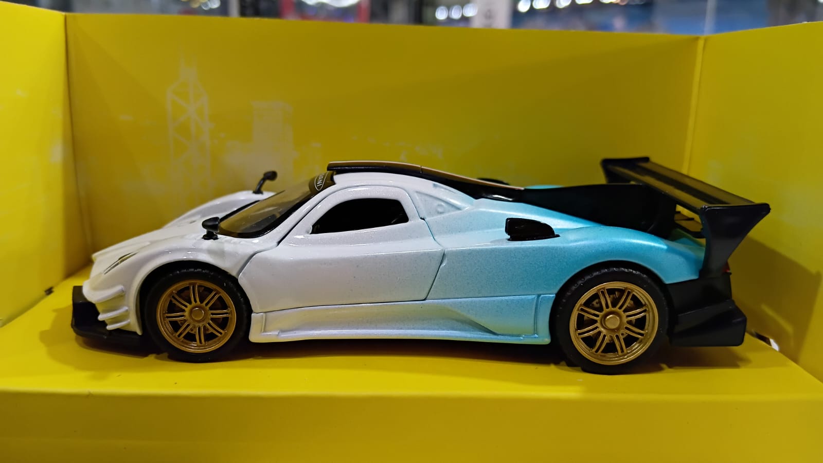 CCA 1:36 PAGANI ZONDA REVOLUCION DIECAST MODEL 12007 WHITE/BLUE