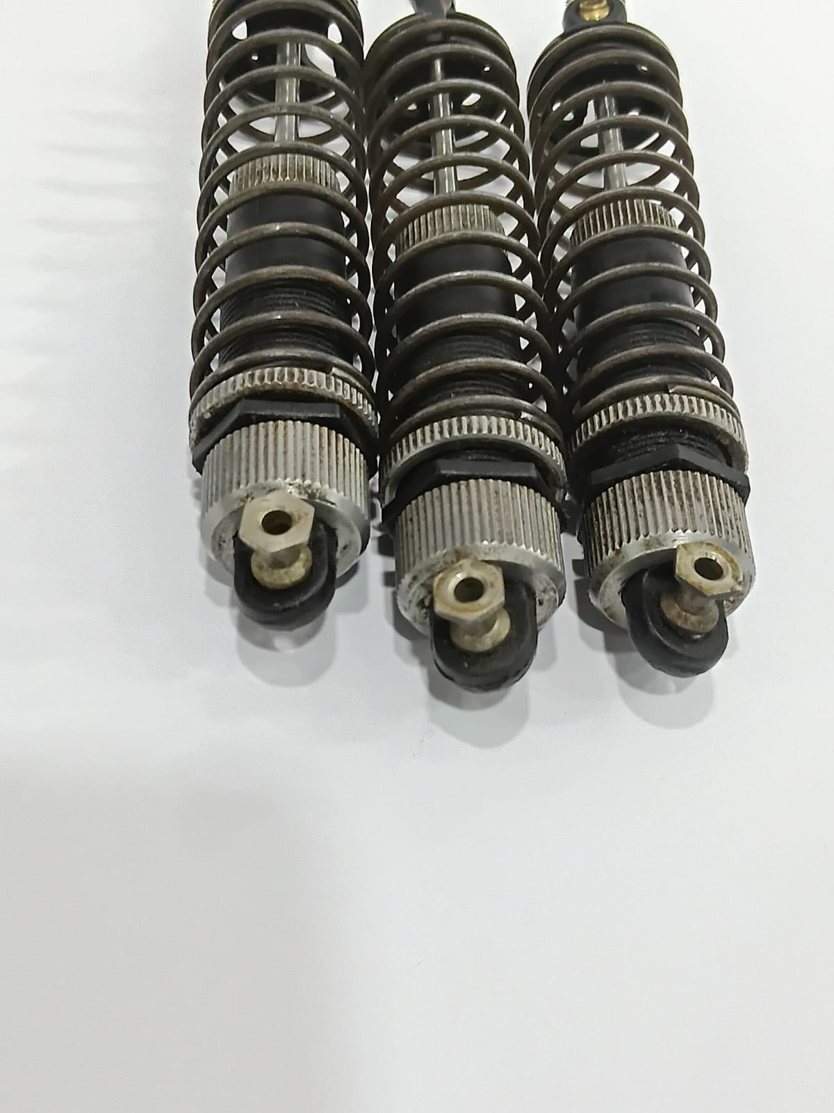 SHOCK ABSORBER 1:8 SCALE (PARTS NOT THERE) PACK OF 3 AND 1 (QUALITY PRE OWNED)