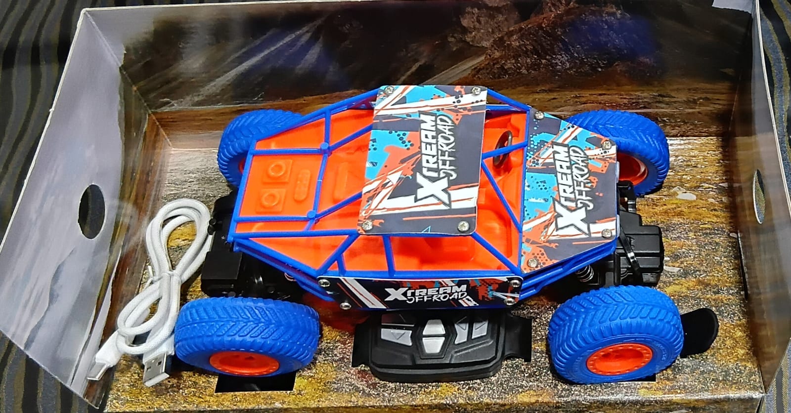 MIRANA DUSTER WATCH REMOTE 2WD, SCALE 1:20, ALL TERRAIN VEHICLE  2.4 GHZ RANGE, 1200 MAH BATTERY, C-TYPE RECHARGEABLE BATTERY, 1.5*POWERFULL BOOST (ORANGE BLUE)